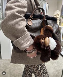 Hovedbilde STICKY BESTIE | FLUFFY MONKEY BAG CHARM 